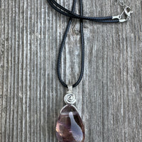 Ametrine for Connecting Physical and Metaphysical Realms, Clarity, and Harmony. Swirl to Signify Consciousness.