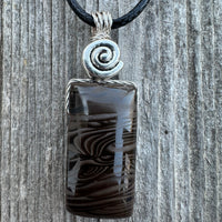 Psilomelan for Release, Truth and Intuition. Swirl to Signify Consciousness.