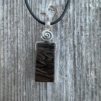 Psilomelan for Release, Truth and Intuition. Swirl to Signify Consciousness.