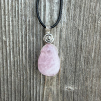 Rose Quartz for Love. Swirl to Signify Consciousness