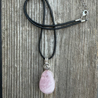 Rose Quartz for Love. Swirl to Signify Consciousness