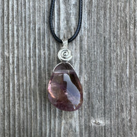 Ametrine for Connecting Physical and Metaphysical Realms, Clarity, and Harmony. Swirl to Signify Consciousness.