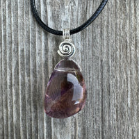 Ametrine for Connecting Physical and Metaphysical Realms, Clarity, and Harmony. Swirl to Signify Consciousness.
