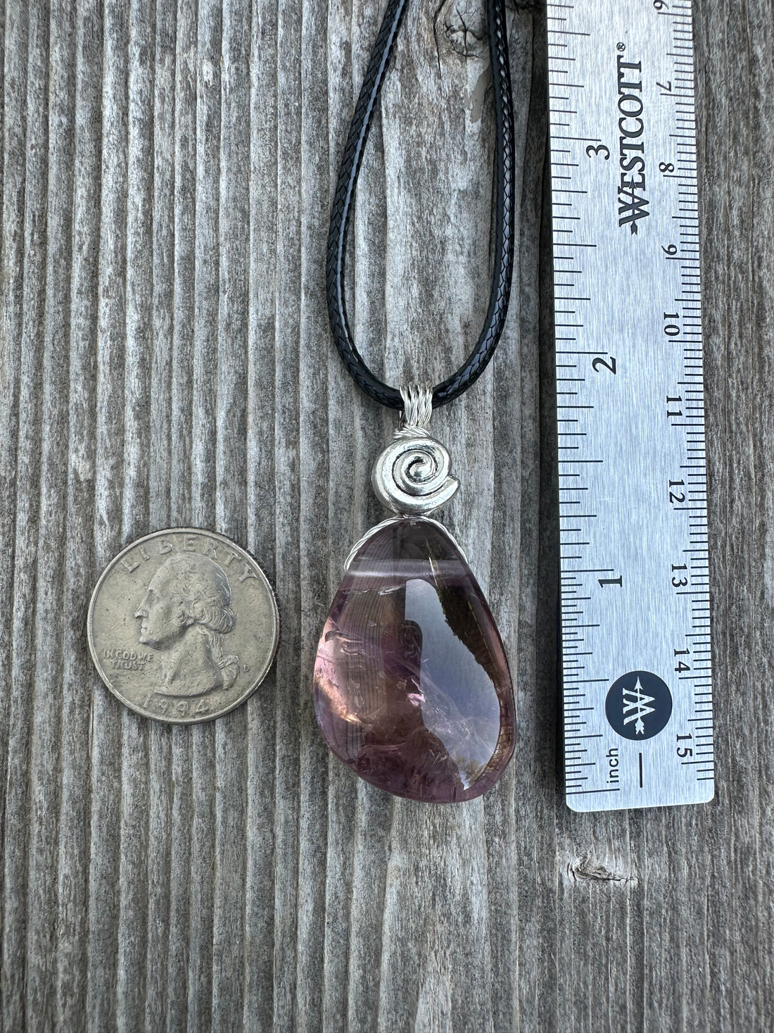 Ametrine for Connecting Physical and Metaphysical Realms, Clarity, and Harmony. Swirl to Signify Consciousness.