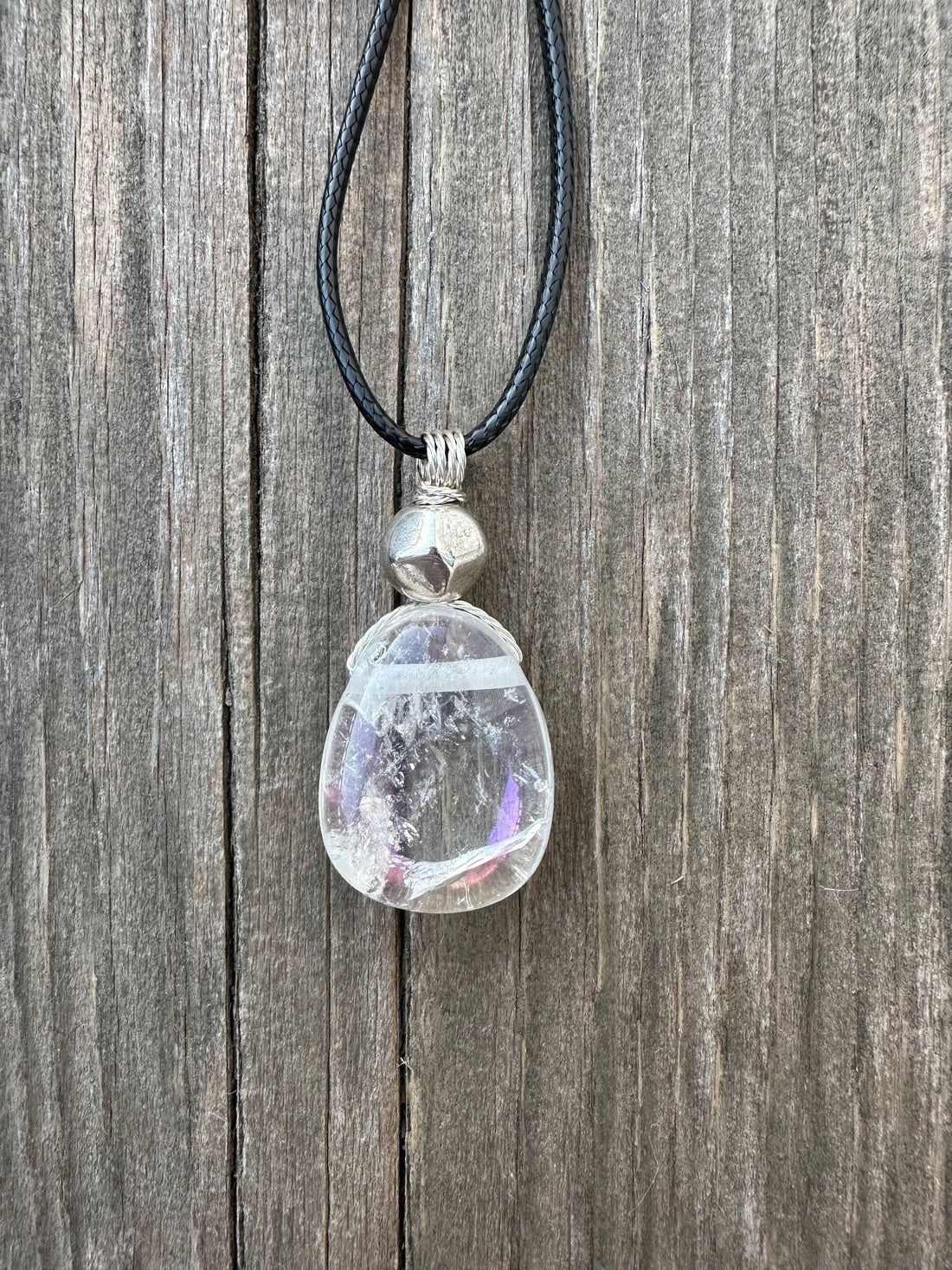 Angel Aura Quartz for Awakening and Releasing Karmic Ties. Swirl to Signify Consciousness.