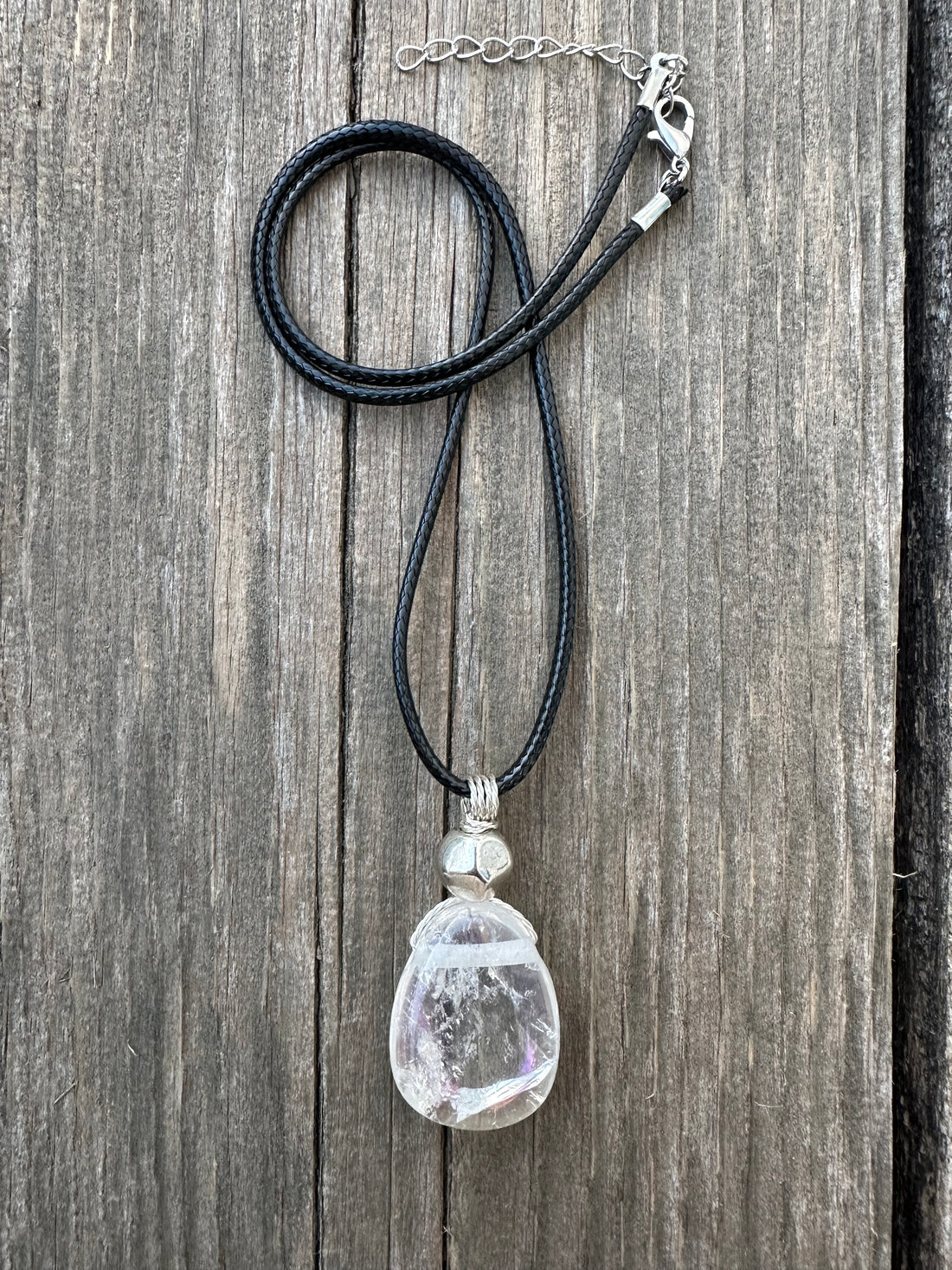 Angel Aura Quartz for Awakening and Releasing Karmic Ties. Swirl to Signify Consciousness.