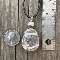 Angel Aura Quartz for Awakening and Releasing Karmic Ties. Swirl to Signify Consciousness.