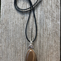 Petrified Wood Necklace for Transformation. Swirl Signifies Consciousness.