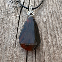Condor Agate for Abundance, Positivity and Grounding. Swirl toSignify Consciousness.
