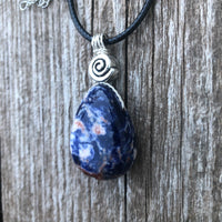 Sodalite for Creativity and Inspiration. Swirl to Signify Consciousness.