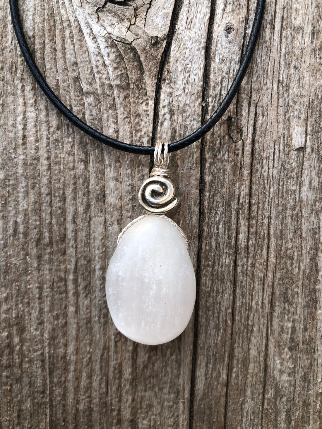 Selenite Necklace for Clearing Energy and Understanding. Swirl Signifies Consciousness