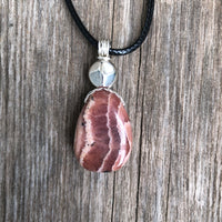 Rhodochrosite for Positivity and Love. Accent Piece is Pewter.