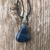 Sieber Agate for Strength, Confidence and Protection. Swirl to Signify Consciousness.