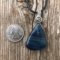 Sieber Agate for Strength, Confidence and Protection. Swirl to Signify Consciousness.