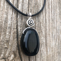 Hawkeye Blue Tiger’s Eye for Positivity and Protection. Swirl to Signify Consciousness.