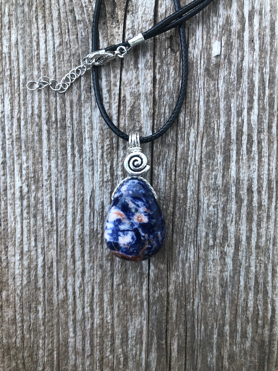 Sodalite for Creativity and Inspiration. Swirl to Signify Consciousness.