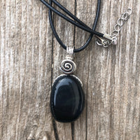 Hawkeye Blue Tiger’s Eye for Positivity and Protection. Swirl to Signify Consciousness.