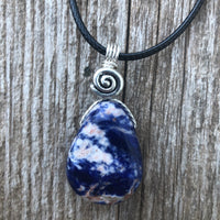 Sodalite for Creativity and Inspiration. Swirl to Signify Consciousness.