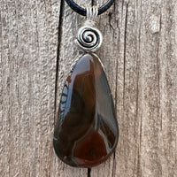 Condor Agate for Abundance, Positivity and Grounding. Swirl toSignify Consciousness.