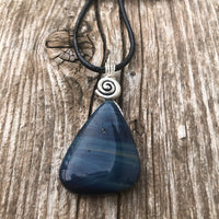 Sieber Agate for Strength, Confidence and Protection. Swirl to Signify Consciousness.