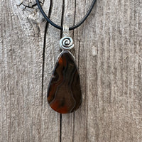 Condor Agate for Abundance, Positivity and Grounding. Swirl toSignify Consciousness.