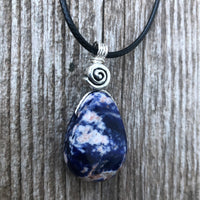 Sodalite for Creativity and Inspiration. Swirl to Signify Consciousness.