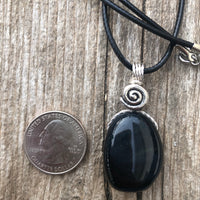 Hawkeye Blue Tiger’s Eye for Positivity and Protection. Swirl to Signify Consciousness.
