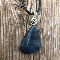 Sieber Agate for Strength, Confidence and Protection. Swirl to Signify Consciousness.