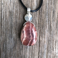 Rhodochrosite for Positivity and Love. Accent Piece is Pewter.