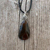 Condor Agate for Abundance, Positivity and Grounding. Swirl toSignify Consciousness.