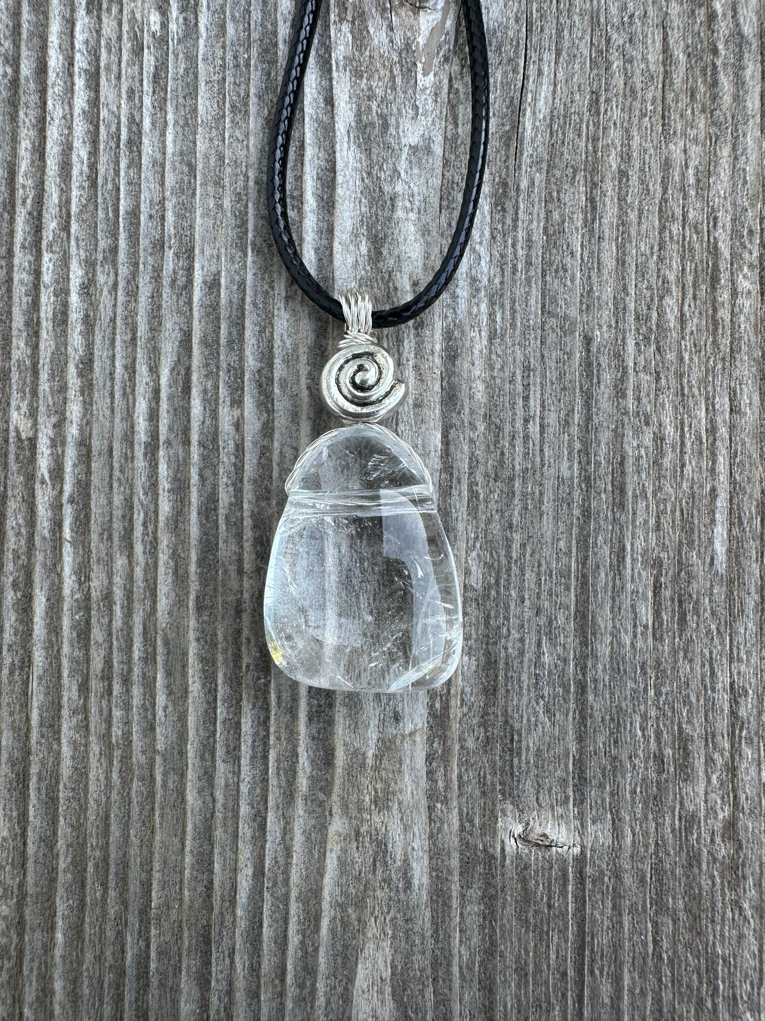 Rock Crystal for Wisdom, Loyalty and Protection. Swirl to Signify Consciousness.