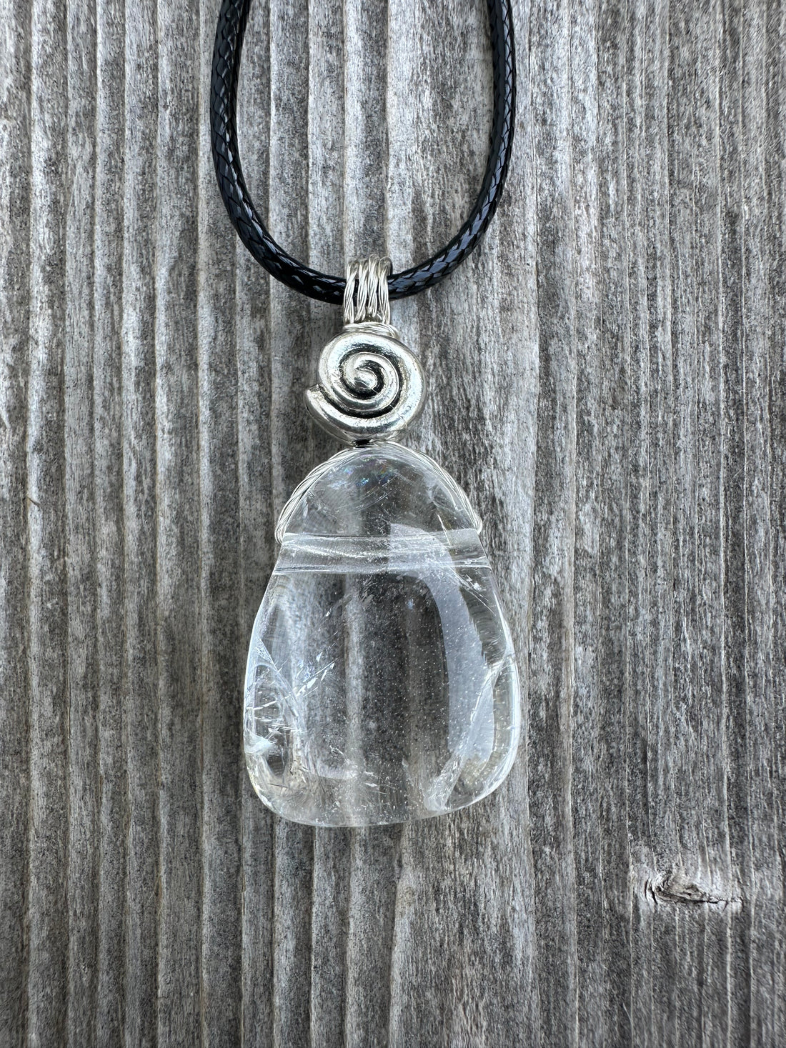 Rock Crystal for Wisdom, Loyalty and Protection. Swirl to Signify Consciousness.