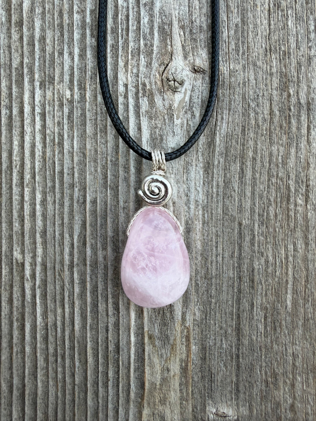 Rose Quartz for Love. Swirl to Signify Consciousness