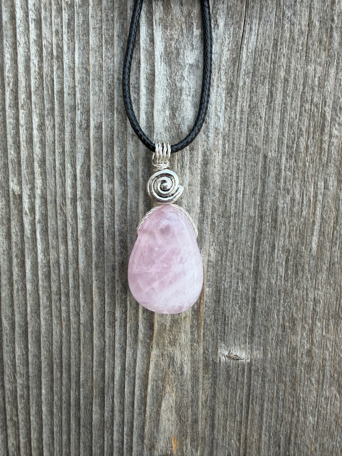 Rose Quartz for Love. Swirl to Signify Consciousness