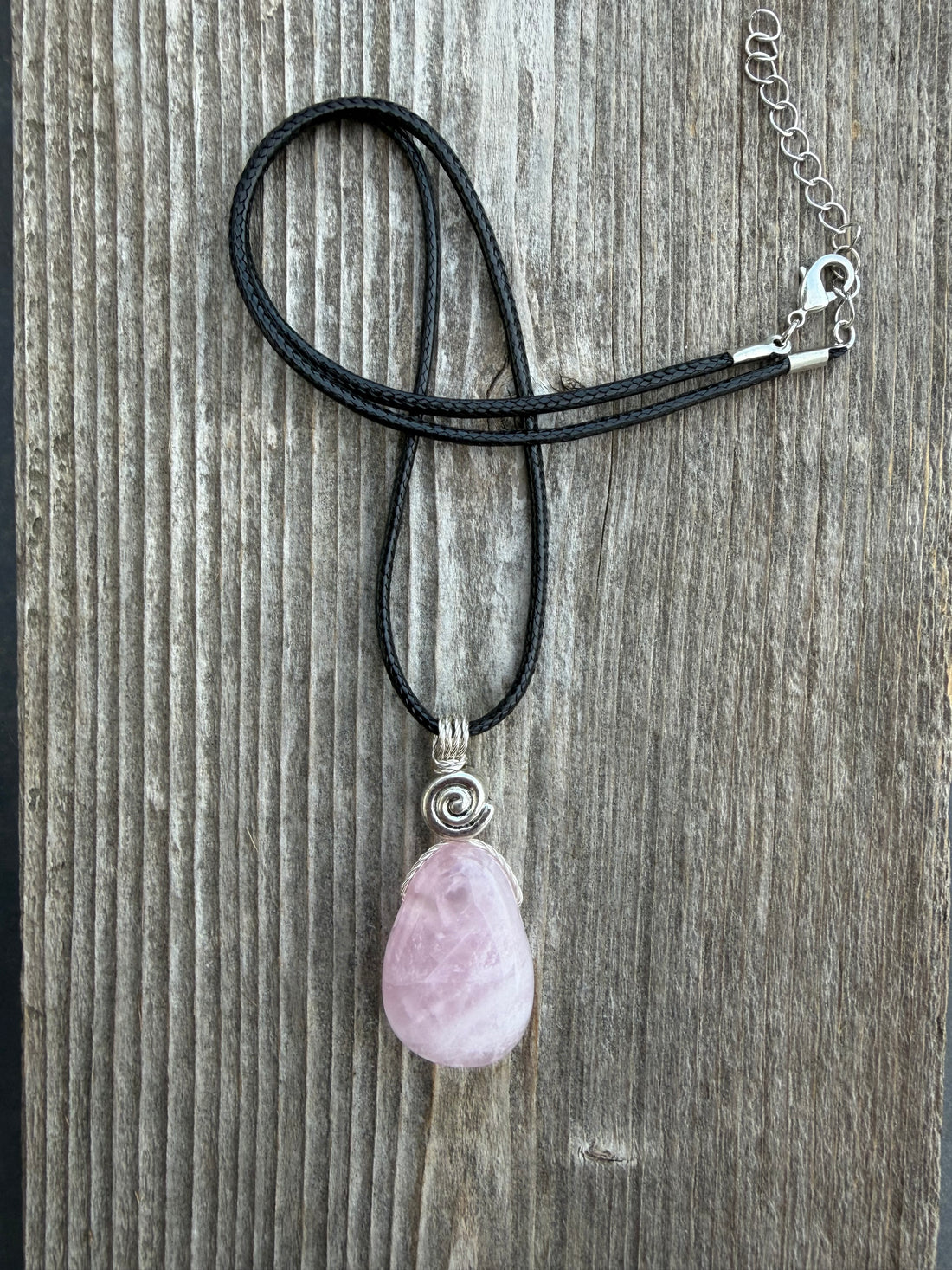 Rose Quartz for Love. Swirl to Signify Consciousness