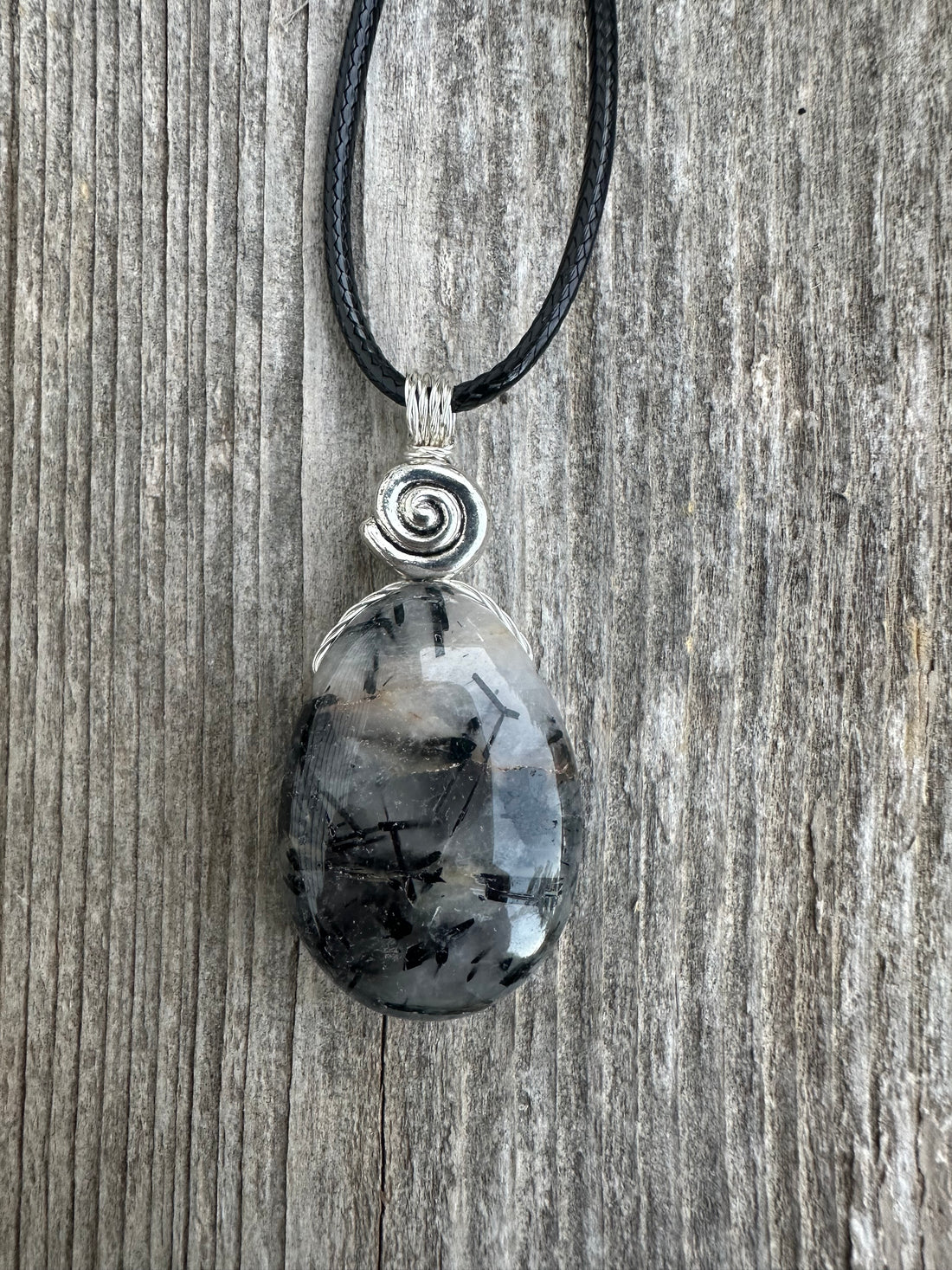 Tourmalated Quartz to Strengthen Auric Field, Bring Energy and Protection. Swirl Signifies Consciousness