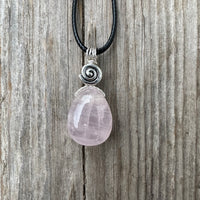 Rose Quartz for Love. Swirl to Signify Consciousness