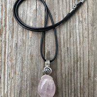 Rose Quartz for Love. Swirl to Signify Consciousness