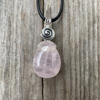 Rose Quartz for Love. Swirl to Signify Consciousness