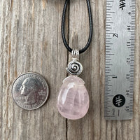 Rose Quartz for Love. Swirl to Signify Consciousness