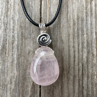 Rose Quartz for Love. Swirl to Signify Consciousness