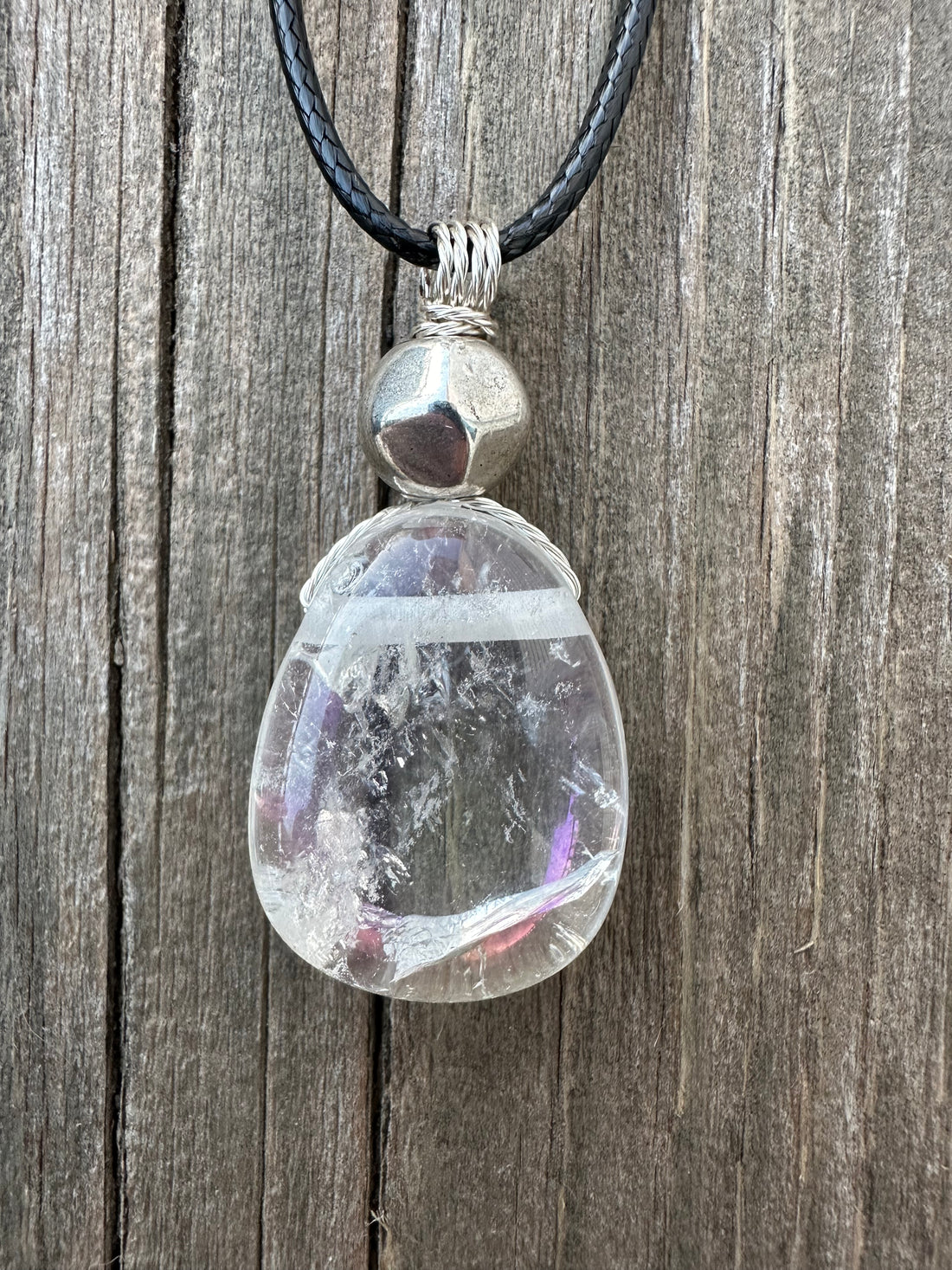 Angel Aura Quartz for Awakening and Releasing Karmic Ties. Swirl to Signify Consciousness.