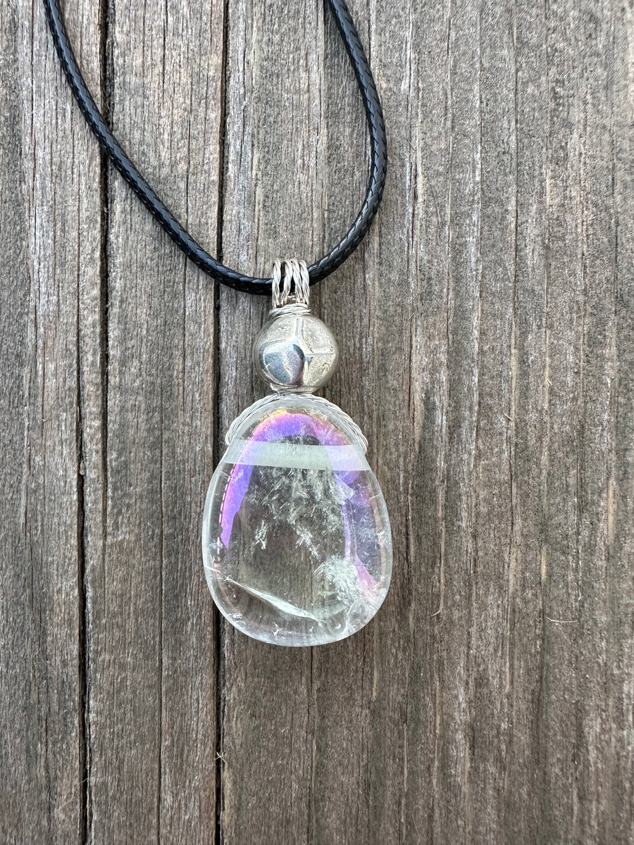 Angel Aura Quartz for Awakening and Releasing Karmic Ties. Swirl to Signify Consciousness.