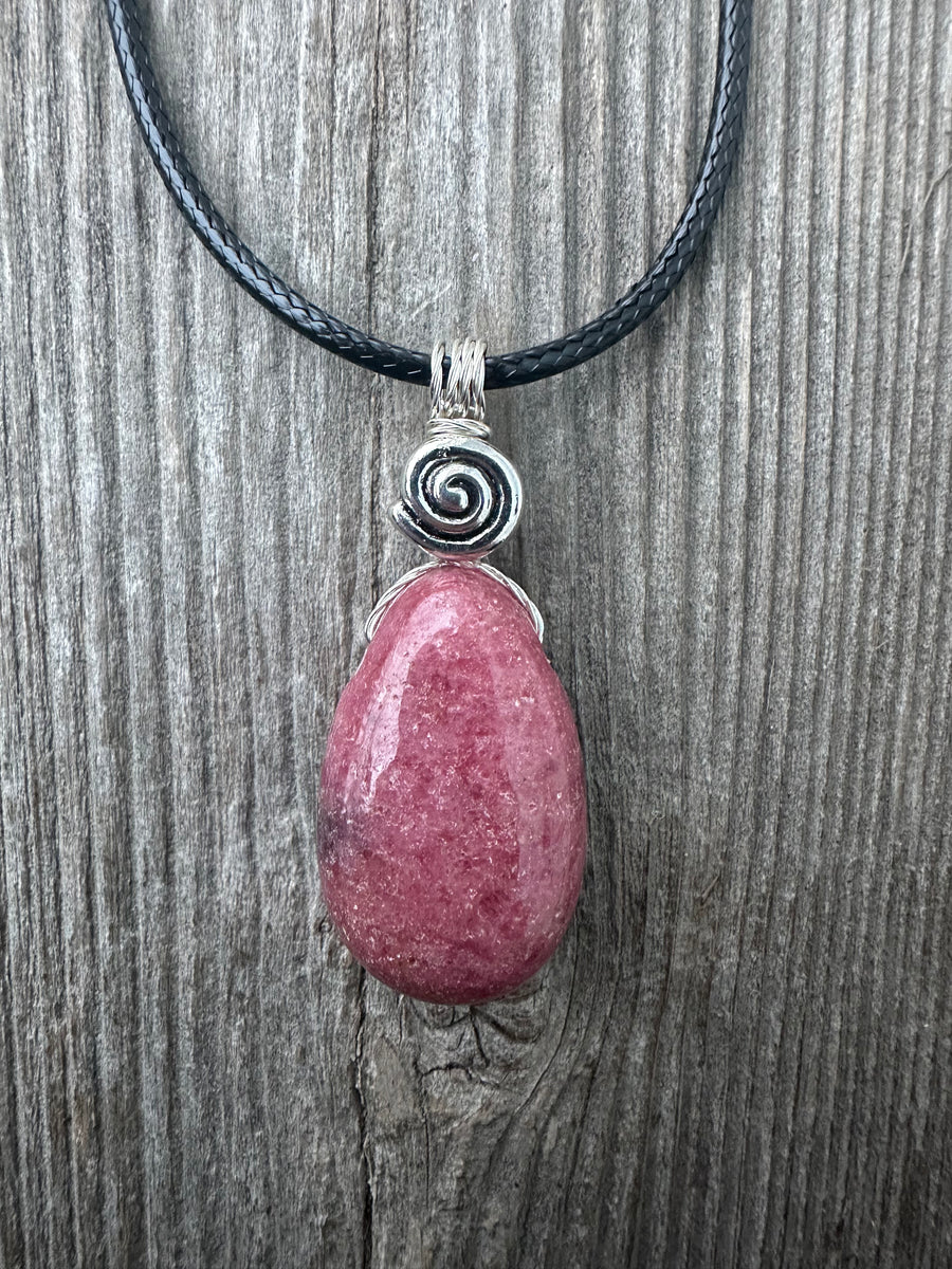 Rhodonite for Compassion, Balancing Emotions, and Self Confidence. Swirl to Signify Consciousness.