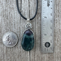 Fluorite Necklace for Protection, Spiritual Awakening, and Self-Confidence. Swirl to Signify Consciousness.