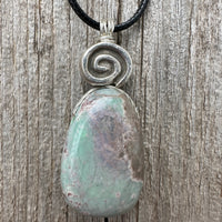 Variscite for Encouragement, Abundance, and Love. Swirl to Signify Consciousness.