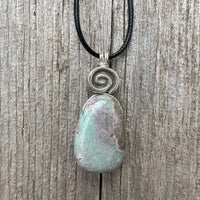 Variscite for Encouragement, Abundance, and Love. Swirl to Signify Consciousness.