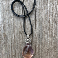 Ametrine for Connecting Physical and Metaphysical Realms, Clarity, and Harmony. Swirl to Signify Consciousness.