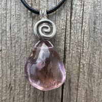 Ametrine for Connecting Physical and Metaphysical Realms, Clarity, and Harmony. Swirl to Signify Consciousness.