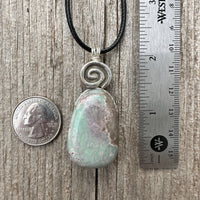 Variscite for Encouragement, Abundance, and Love. Swirl to Signify Consciousness.